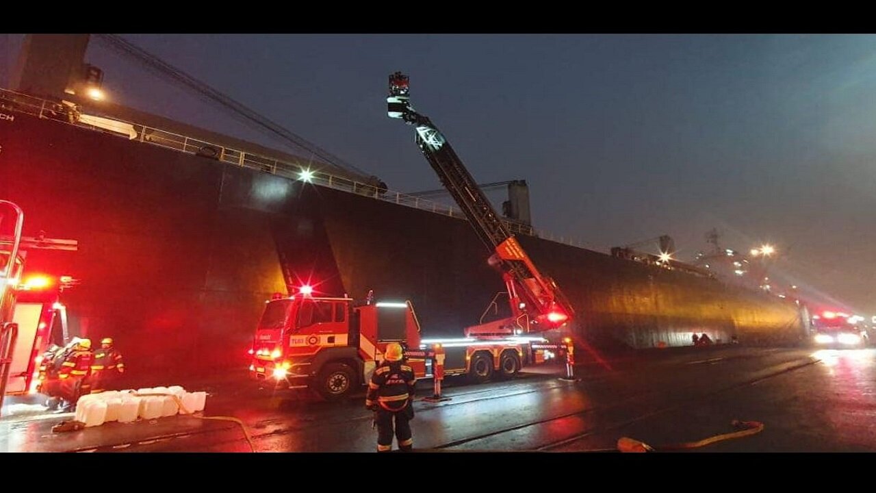 Firefighters Save Burning Container
